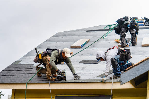 Professional Gutter Installation technician working in Greensburg, IN